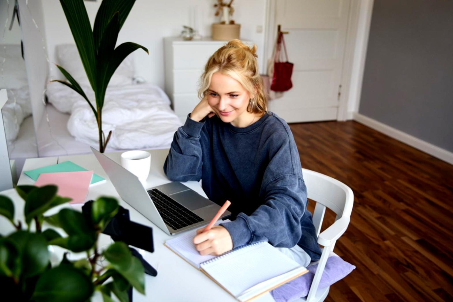 Modern office environment with analysts reviewing financial models on multiple screens