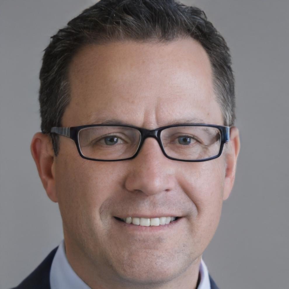 Professional headshot of Dimitri Vanstone, Senior Finance Instructor